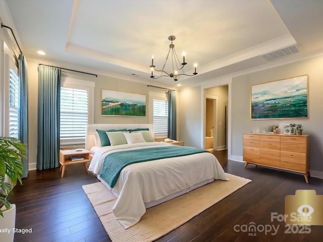 9426 Greyson Ridge Dr, Charlotte, NC 28277 - bedroom featuring a tray ceiling, a chandelier, ornamental molding, dark wood finished floors, and baseboards