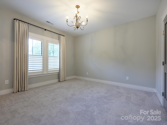9426 Greyson Ridge Dr, Charlotte, NC 28277 - carpeted spare room with a chandelier and baseboards