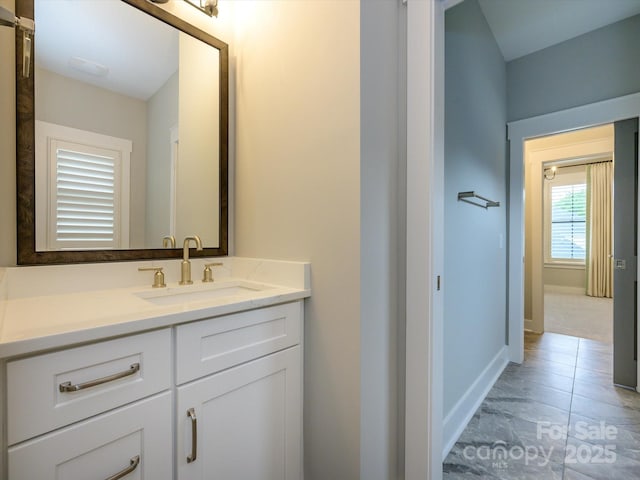 9426 Greyson Ridge Dr, Charlotte, NC 28277 - bathroom featuring vanity, baseboards, and tile patterned floors