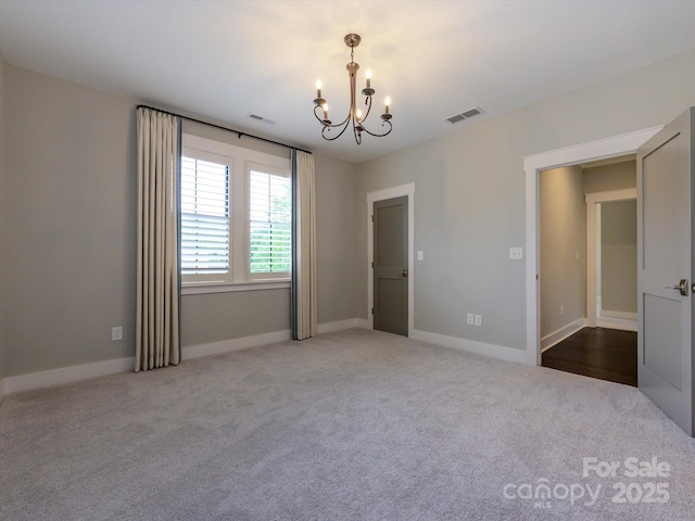 9426 Greyson Ridge Dr, Charlotte, NC 28277 - unfurnished bedroom featuring a chandelier, carpet flooring, and baseboards