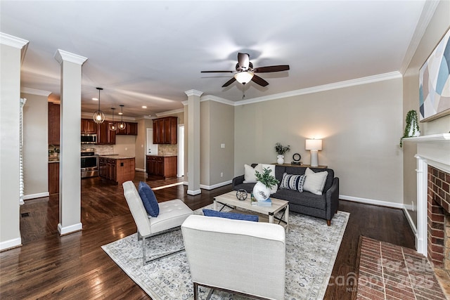 4637 Shannamara Dr, Matthews, NC 28104 - living room featuring ceiling fan, a fireplace, dark wood-style flooring, crown molding, and baseboards