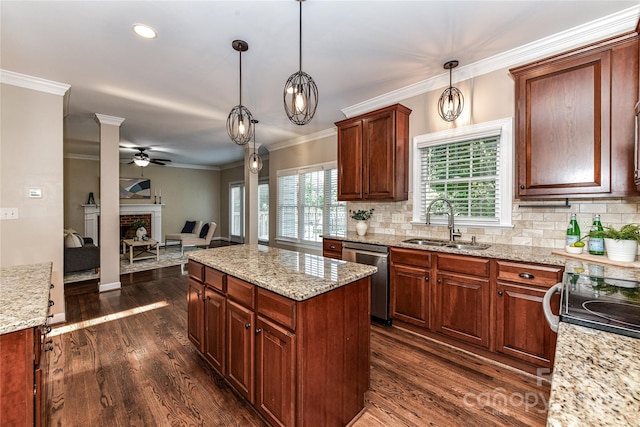 4637 Shannamara Dr, Matthews, NC 28104 - kitchen featuring dishwasher, a sink, ceiling fan, a brick fireplace, and dark wood-type flooring