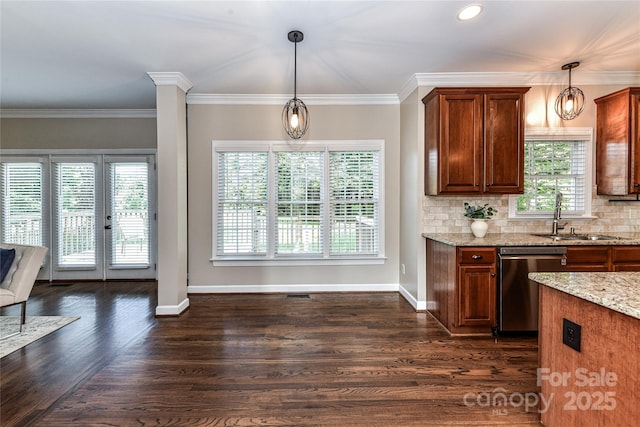 4637 Shannamara Dr, Matthews, NC 28104 - kitchen featuring stainless steel dishwasher, a sink, light stone counters, baseboards, and hanging light fixtures