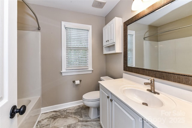4637 Shannamara Dr, Matthews, NC 28104 - bathroom with baseboards, vanity, toilet, marble finish flooring, and shower / bathtub combination