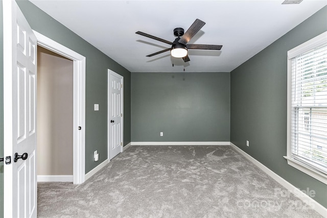 4637 Shannamara Dr, Matthews, NC 28104 - carpeted spare room with a ceiling fan and baseboards