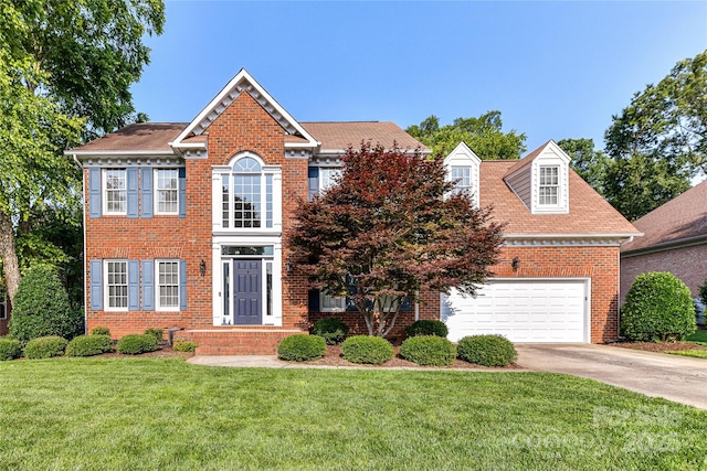 4637 Shannamara Dr, Matthews, NC 28104 - georgian-style home featuring driveway, brick siding, a front lawn, and a garage
