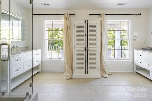 55 Foster Estate Dr, Asheville, NC 28806 - entryway with a sink, baseboards, and light tile patterned floors