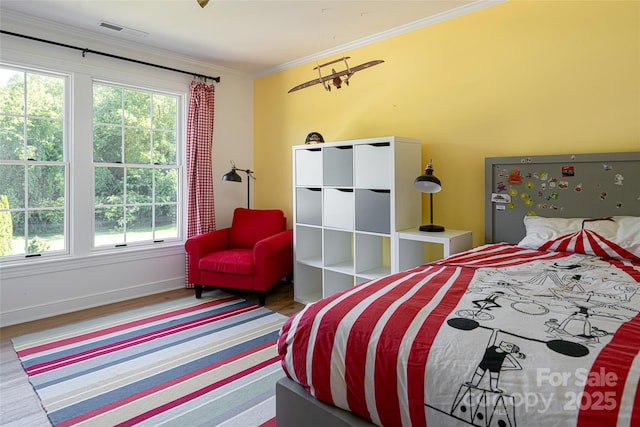 55 Foster Estate Dr, Asheville, NC 28806 - bedroom featuring ornamental molding, wood finished floors, and baseboards