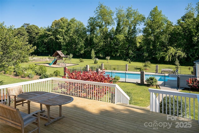 55 Foster Estate Dr, Asheville, NC 28806 - wooden deck with a playground and view of scattered trees