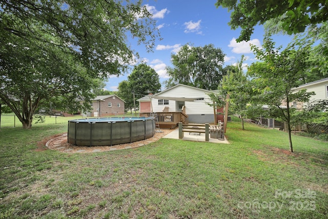 842 Cherry Rd S, Rock Hill, SC 29732 - view of green lawn with a wooden deck and an outdoor pool