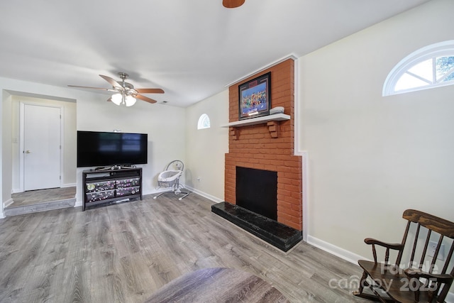 842 Cherry Rd S, Rock Hill, SC 29732 - living area with ceiling fan, wood finished floors, and a fireplace