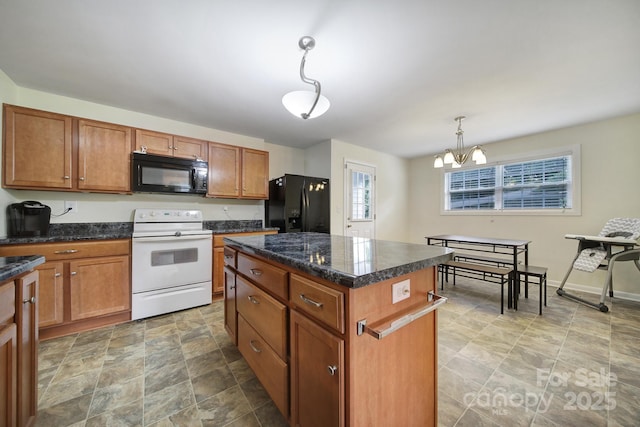 842 Cherry Rd S, Rock Hill, SC 29732 - kitchen featuring black appliances, brown cabinetry, stone finish flooring, a center island, and a chandelier