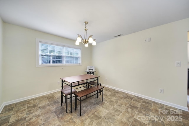 842 Cherry Rd S, Rock Hill, SC 29732 - dining room featuring a chandelier and stone finish floors