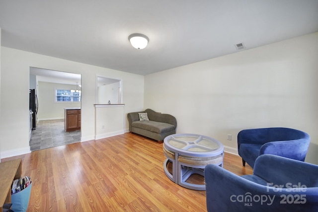 842 Cherry Rd S, Rock Hill, SC 29732 - living area featuring a chandelier and light wood-style flooring