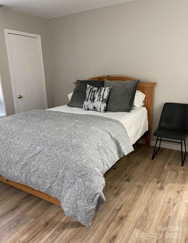 11421 Kingfisher Dr, Charlotte, NC 28226 - bedroom featuring wood finished floors