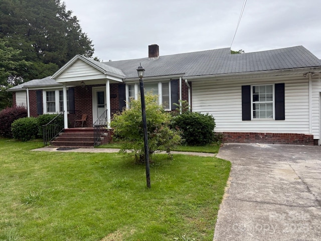 1292 Longview Rd, Rock Hill, SC 29732 - single story home featuring a chimney, a front yard, and brick siding