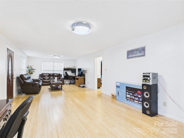 3055 16th St NE, Hickory, NC 28601 - living room featuring wood finished floors and an office area