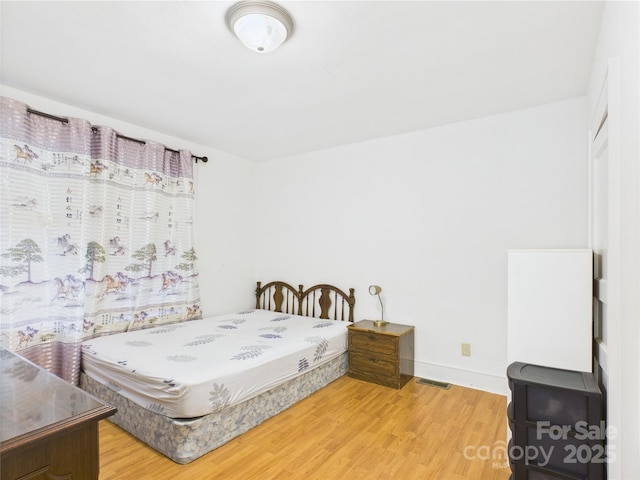 3055 16th St NE, Hickory, NC 28601 - bedroom featuring wood finished floors and baseboards