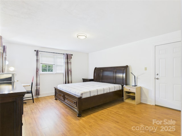3055 16th St NE, Hickory, NC 28601 - bedroom featuring light wood-style floors and baseboards