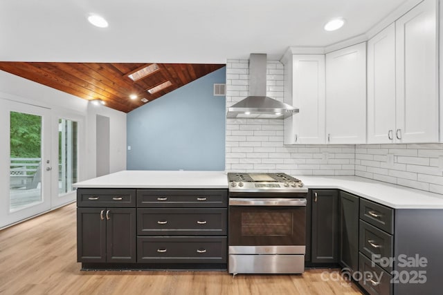 8338 Rittenhouse Cir, Charlotte, NC 28270 - kitchen featuring stainless steel gas stove, wall chimney range hood, white cabinetry, light countertops, and wood ceiling