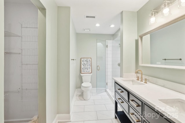 8338 Rittenhouse Cir, Charlotte, NC 28270 - bathroom featuring a stall shower, double vanity, toilet, recessed lighting, and a walk in closet