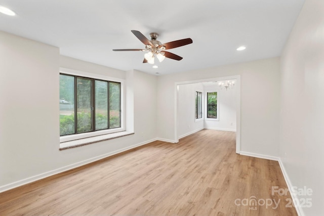 8338 Rittenhouse Cir, Charlotte, NC 28270 - empty room with baseboards, wood finished floors, recessed lighting, and a chandelier