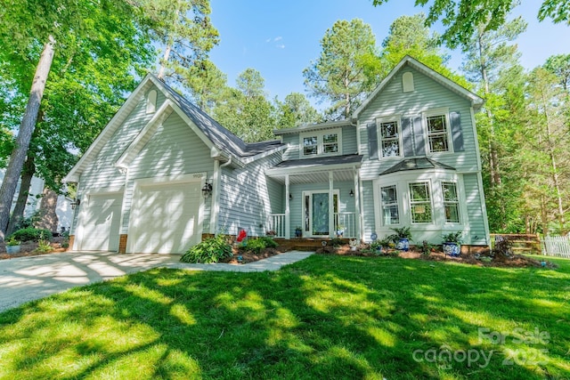 9920 White Cascade Dr, Charlotte, NC 28269 - view of front of house with covered porch, concrete driveway, an attached garage, and a front yard