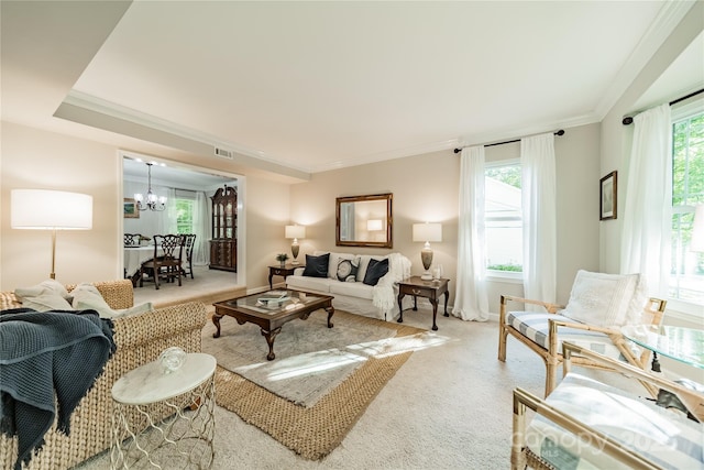 9920 White Cascade Dr, Charlotte, NC 28269 - carpeted living room with a chandelier, ornamental molding, and baseboards