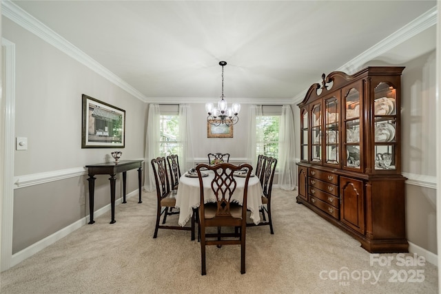 9920 White Cascade Dr, Charlotte, NC 28269 - dining room with a chandelier, ornamental molding, light colored carpet, and baseboards