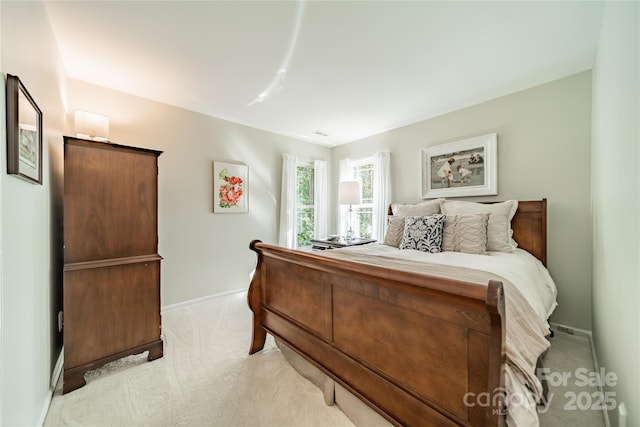 9920 White Cascade Dr, Charlotte, NC 28269 - bedroom with light colored carpet and baseboards