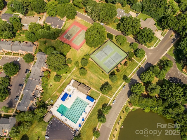 6817 Dumbarton Dr, Charlotte, NC 28210 - aerial perspective of suburban area with a pool and a large body of water