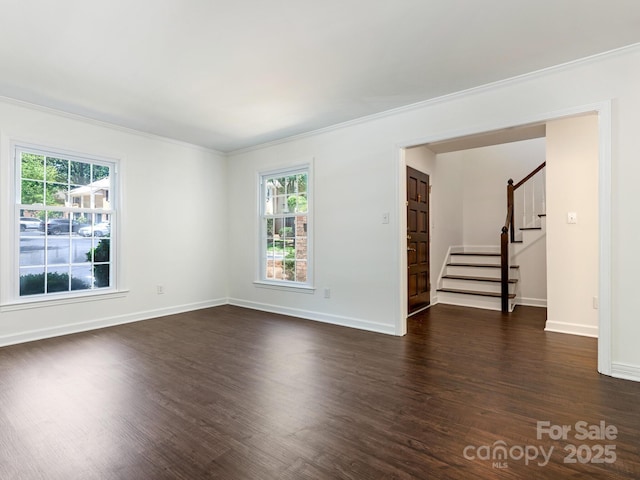 6817 Dumbarton Dr, Charlotte, NC 28210 - unfurnished room with ornamental molding, dark wood finished floors, stairway, and baseboards