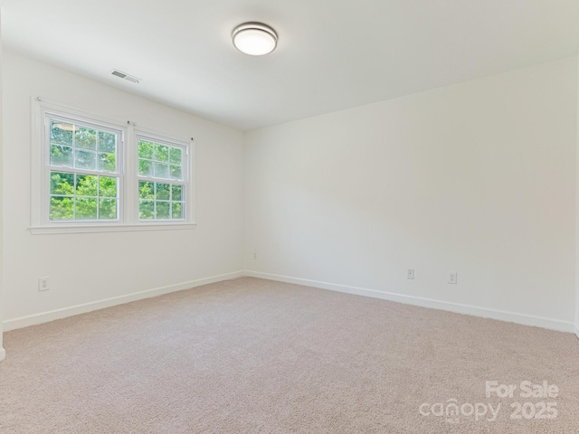 6817 Dumbarton Dr, Charlotte, NC 28210 - unfurnished room with baseboards and carpet