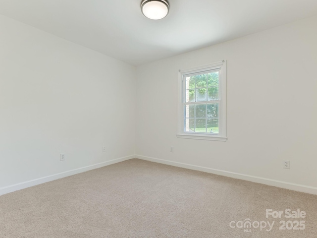 6817 Dumbarton Dr, Charlotte, NC 28210 - empty room with light carpet and baseboards