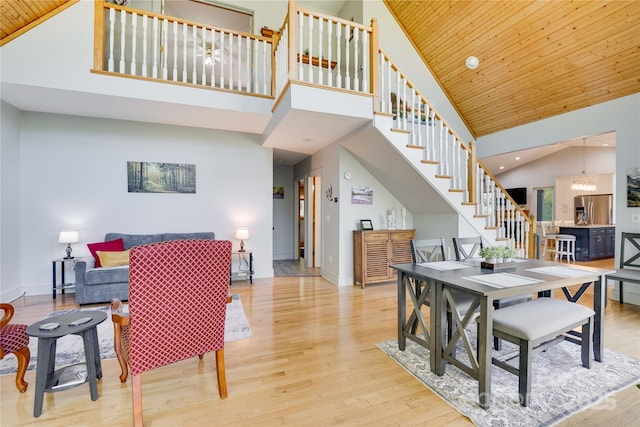 21 Kylie Grace Ln, Candler, NC 28715 - dining room with stairway, high vaulted ceiling, wood finished floors, baseboards, and wooden ceiling