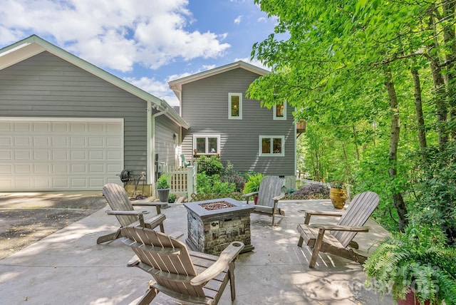 21 Kylie Grace Ln, Candler, NC 28715 - view of patio with a fire pit and driveway