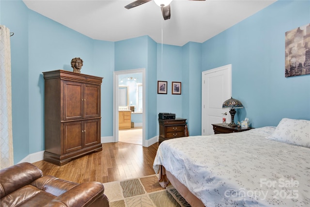 267 Ikerd Dr SE, Concord, NC 28025 - bedroom featuring hardwood / wood-style floors, a ceiling fan, and ensuite bath