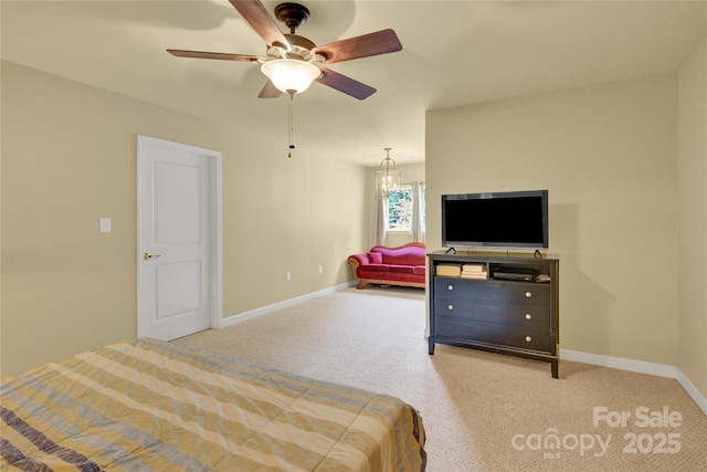 267 Ikerd Dr SE, Concord, NC 28025 - carpeted bedroom featuring baseboards and a ceiling fan