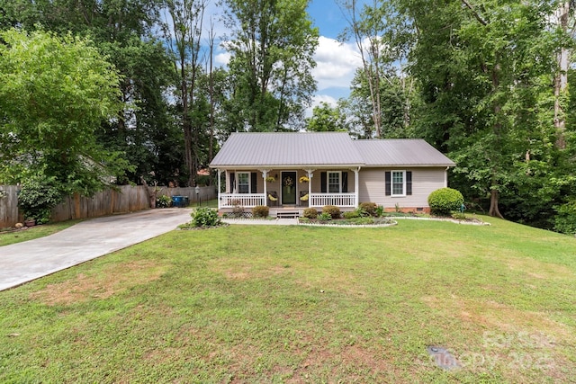 716 Mooresville Rd, Salisbury, NC 28144 - single story home with a porch, driveway, metal roof, and crawl space