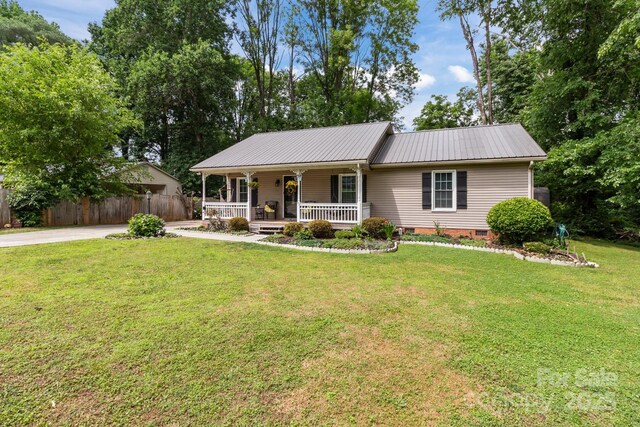716 Mooresville Rd, Salisbury, NC 28144 - ranch-style house featuring covered porch, metal roof, and crawl space