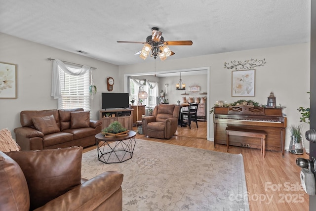 716 Mooresville Rd, Salisbury, NC 28144 - living area featuring a ceiling fan and wood finished floors
