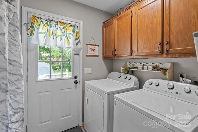 716 Mooresville Rd, Salisbury, NC 28144 - laundry area with cabinet space and washing machine and clothes dryer