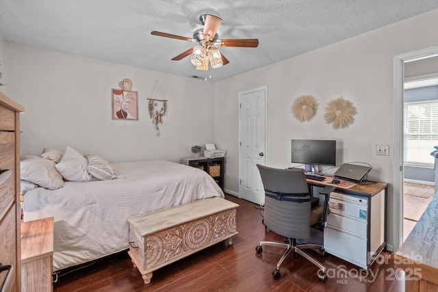 716 Mooresville Rd, Salisbury, NC 28144 - bedroom with a desk, wood finished floors, and a ceiling fan
