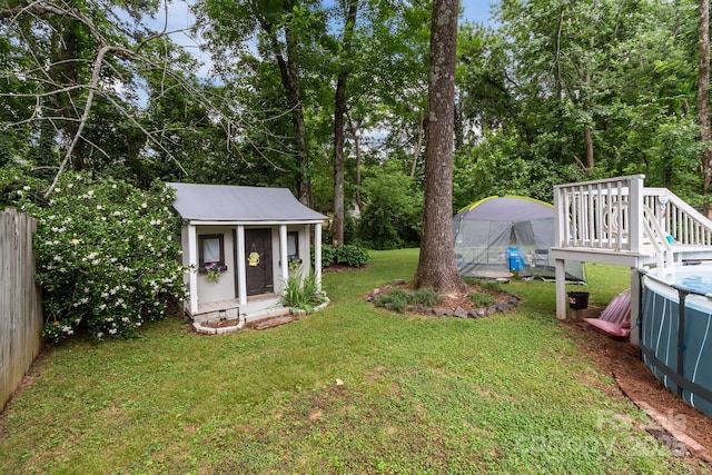 716 Mooresville Rd, Salisbury, NC 28144 - view of yard featuring an outdoor structure and view of scattered trees
