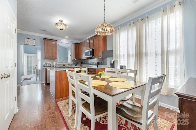 411 Summergate Dr Unit 78, Winston Salem, NC 27103 - dining room with ornamental molding, wood finished floors, and baseboards