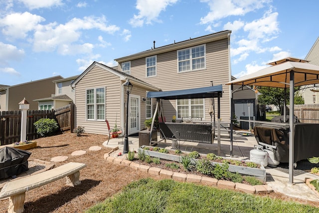 411 Summergate Dr Unit 78, Winston Salem, NC 27103 - back of house with a gazebo, a patio, and a fenced backyard