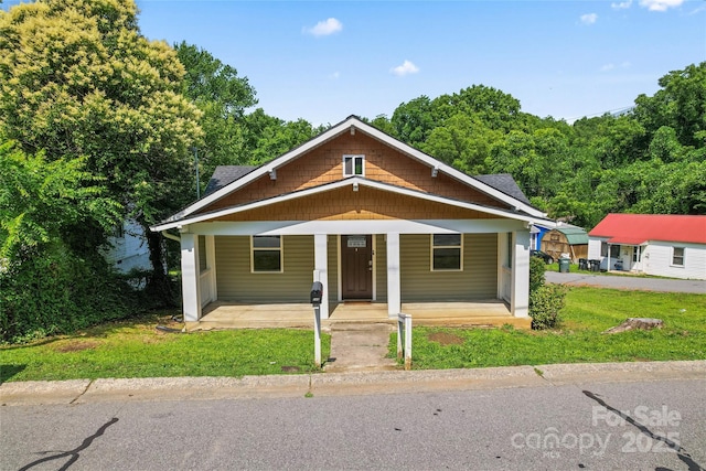 146 Georgia St SW, Concord, NC 28025 - view of front of property featuring covered porch and a front yard