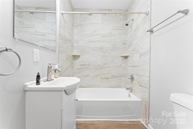 146 Georgia St SW, Concord, NC 28025 - bathroom featuring vanity, shower / tub combination, and wood finished floors