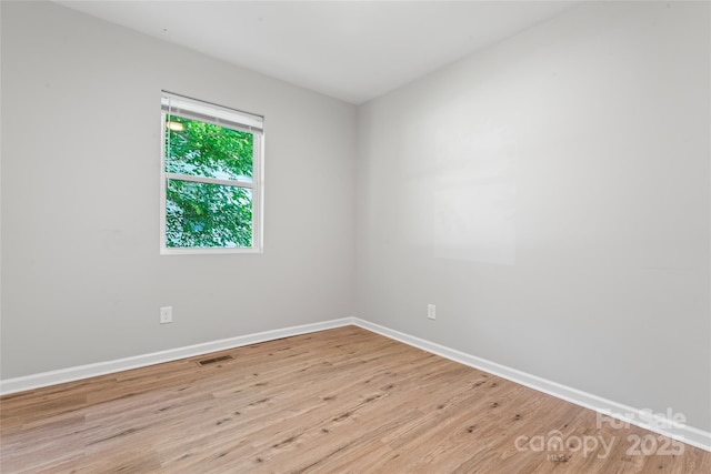 146 Georgia St SW, Concord, NC 28025 - unfurnished room featuring wood finished floors and baseboards