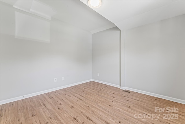 146 Georgia St SW, Concord, NC 28025 - empty room featuring wood finished floors and baseboards
